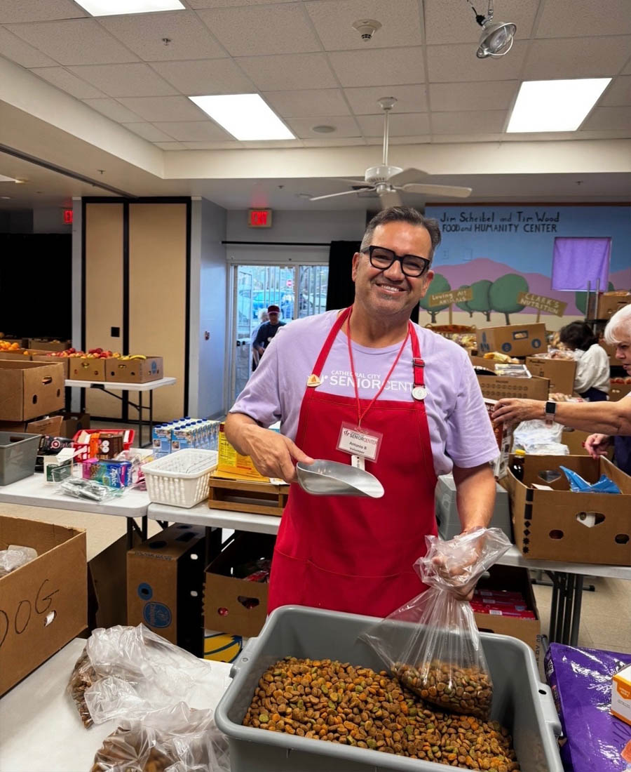 Antonio Baciu serving at a Cathedral City community event for pets.